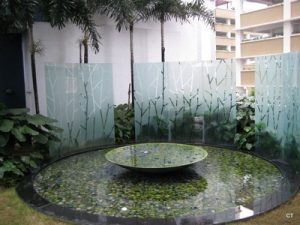 Water feature sandblasted glass panel
